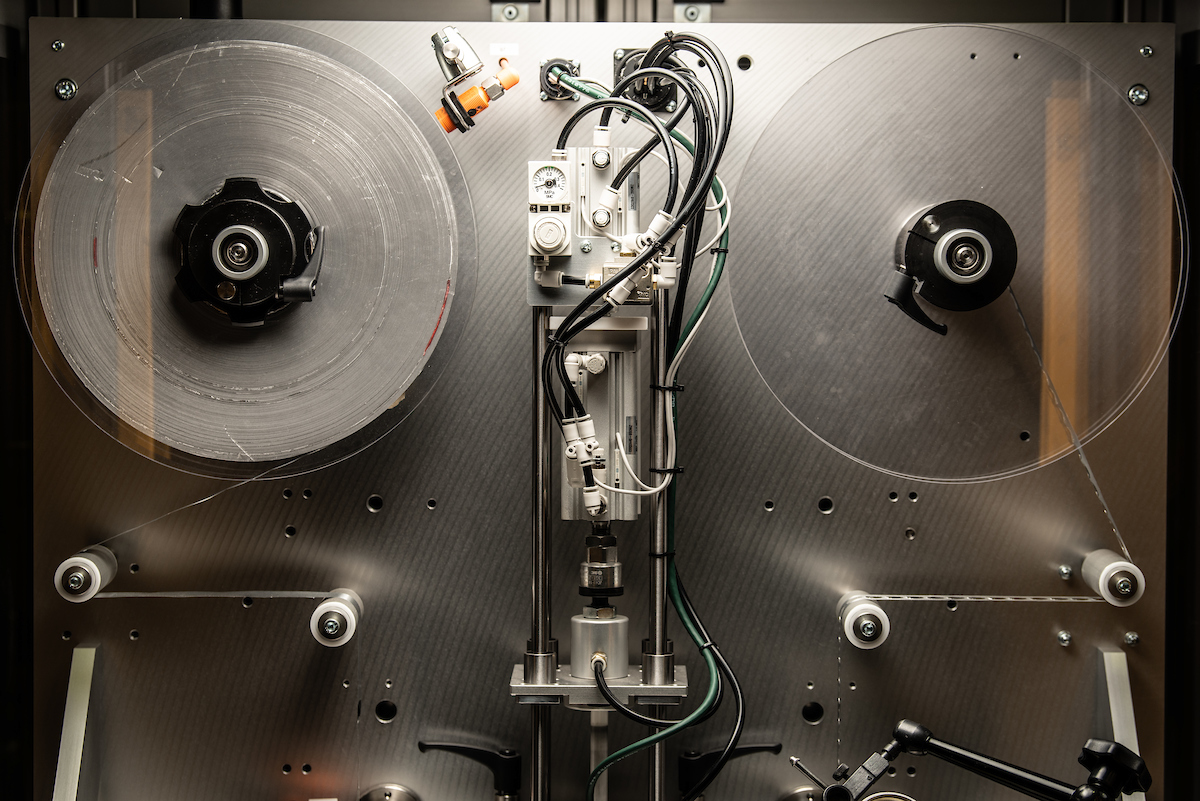 Automated induction sealing machinery